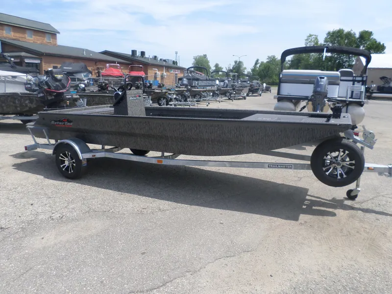 Slide: The Image of 2024 GATOR-TAIL 1860 Extreme CC boat on trailer in outdoor dealership lot. - 1