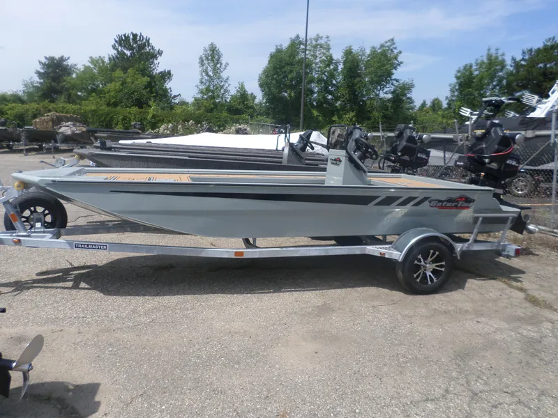 Slide: The Image of 2024 GATOR-TAIL 1860 Extreme CC boat on a trailer, parked outdoors. - 1
