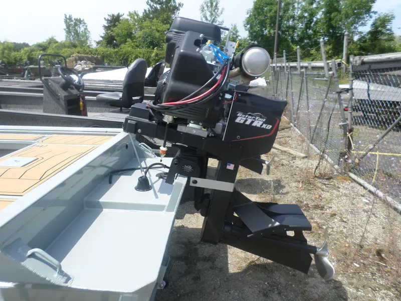 Slide: The Image of 2024 GATOR-TAIL 1860 Extreme CC boat with powerful outboard motor in a yard. - 4