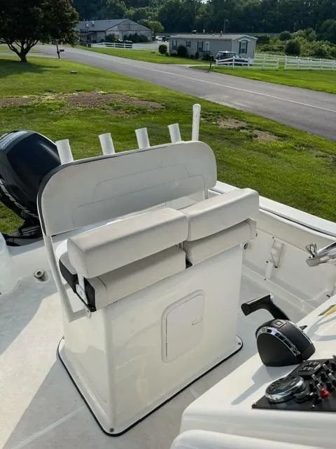 Slide: The Image of 2016 Clearwater 2200 WI Center Console boat with seating and control panel. - 6