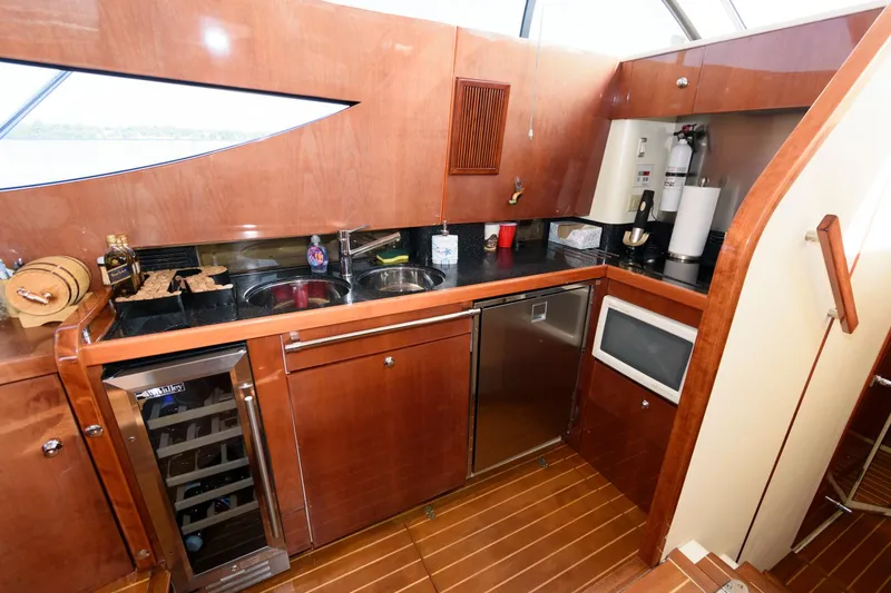 Slide: The Image of Luxurious kitchen area in 2007 Fairline Phantom 46 yacht with modern appliances. - 18
