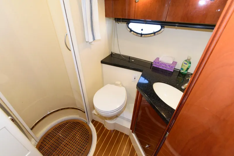 Slide: The Image of Luxurious bathroom in 2007 Fairline Phantom 46 yacht with shower, toilet, and sink. - 24