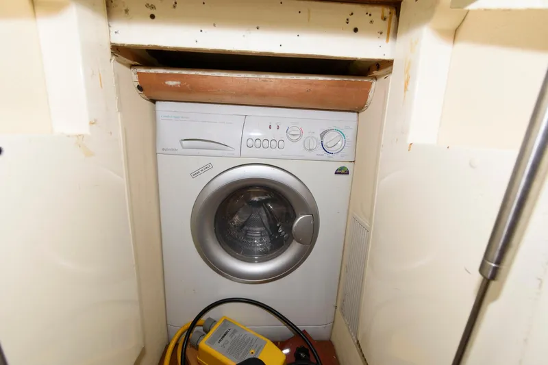 Slide: The Image of Washing machine in a 2007 Fairline Phantom 46 yacht interior compartment. - 28