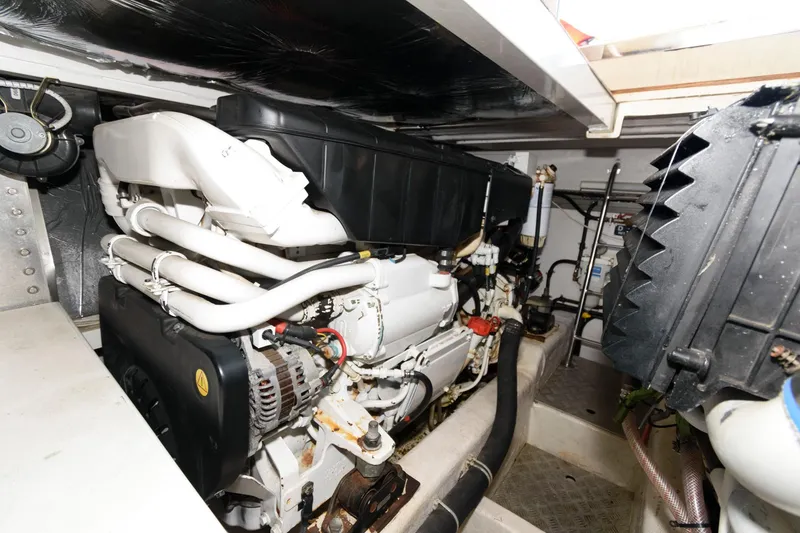 Slide: The Image of Engine room of 2007 Fairline Phantom 46 yacht, showcasing mechanical components and systems. - 30