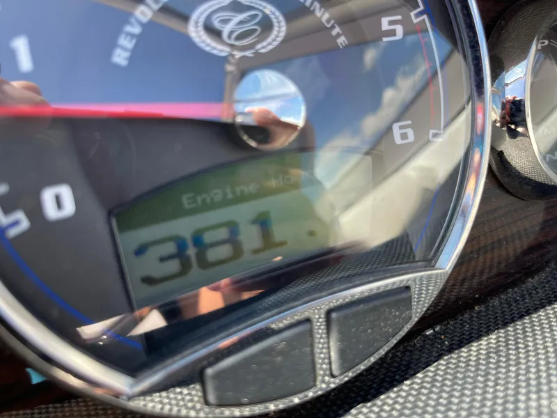 Slide: The Image of Close-up of 2011 Cobalt A25 tachometer displaying 381 engine hours. - 17