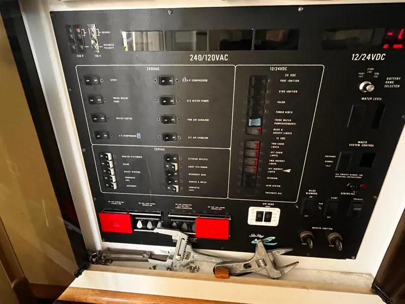 Slide: The Image of Electrical control panel of a 1990 Sea Ray Sedan Bridge 500 yacht. - 14