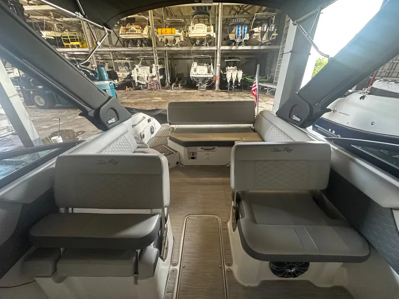 Slide: The Image of Interior of 2022 Sea Ray SDX 250 boat with spacious seating and modern design. - 7