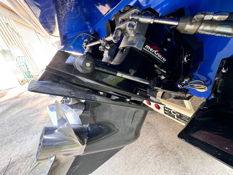 Slide: The Image of Close-up of a 1990 Fountain 42 Lightning boat engine and propeller. - 19