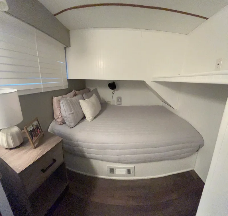 Slide: The Image of Cozy bedroom in 2004 Majestic houseboat with modern decor and soft lighting. - 6