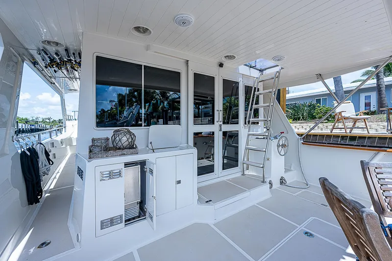 Slide: The Image of Spacious deck of 2000 Offshore Yachts 62 Pilot House with modern amenities. - 22