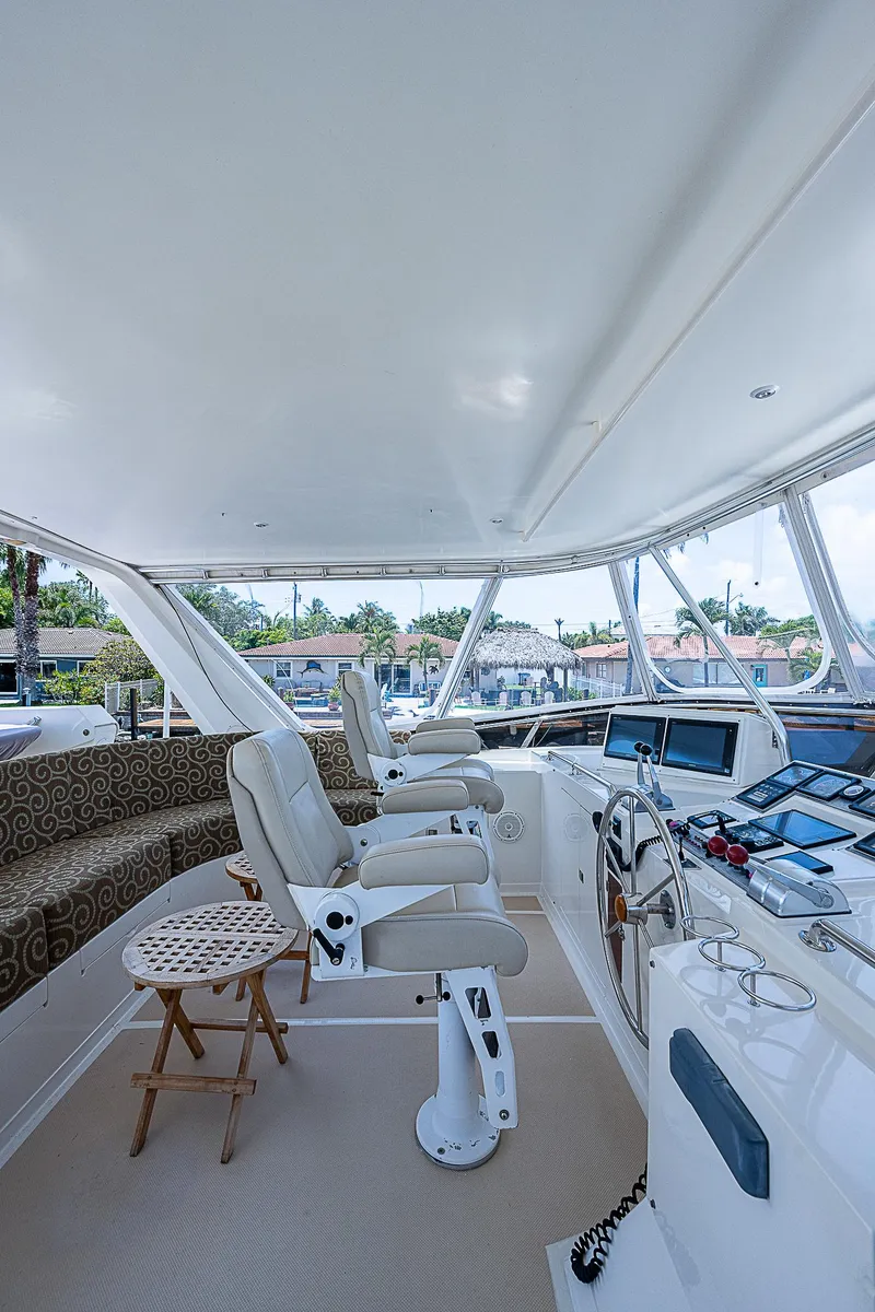 Slide: The Image of Spacious helm area of 2000 Offshore Yachts 62 Pilot House with modern controls. - 28