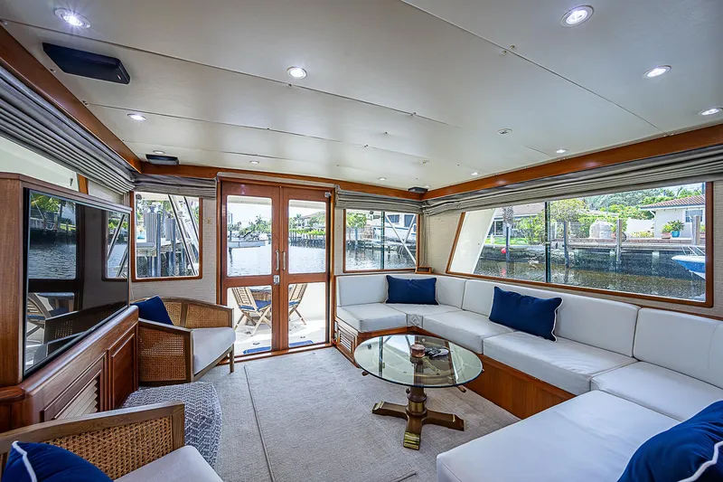 Slide: The Image of Luxurious interior of 2000 Offshore Yachts 62 Pilot House with spacious seating and elegant decor. - 38