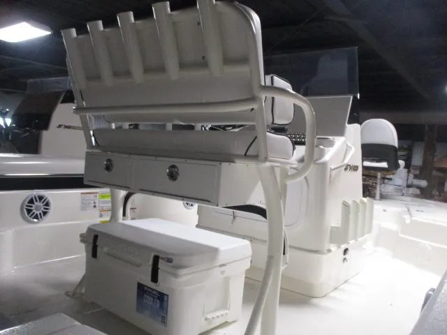 Slide: The Image of 2025 Skeeter SX221 boat interior with seating and storage compartments. - 4