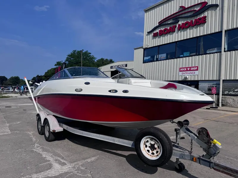 Slide: The Image of 2006 Sugar Sand Oasis boat on trailer outside The Boat House. - 4