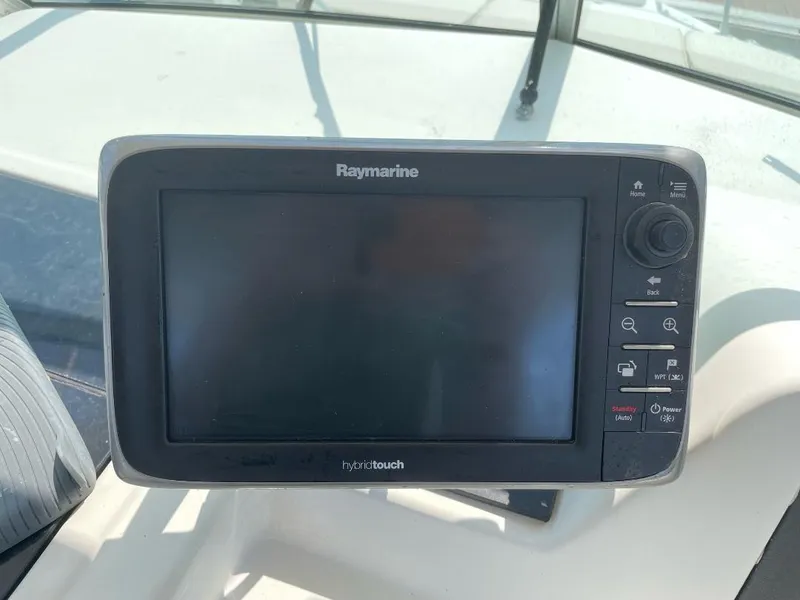 Slide: The Image of Raymarine display on 2000 Grady-White 232 Gulfstream WA boat dashboard. - 17