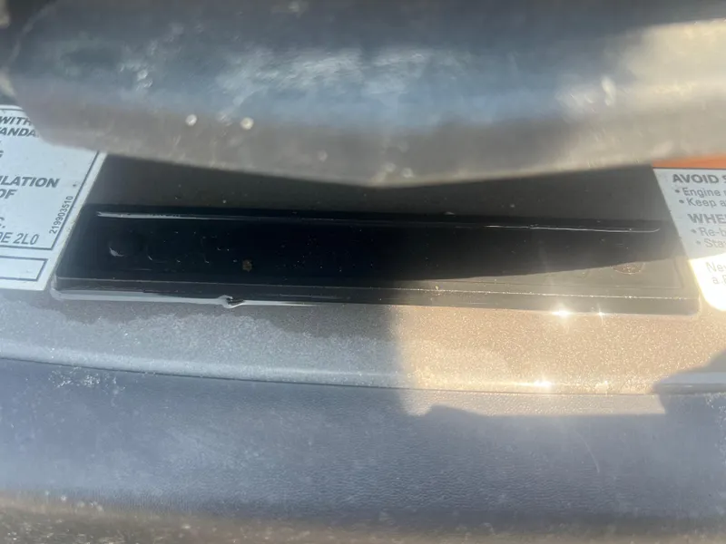 Slide: The Image of Close-up of 2015 Sea-Doo GTX Limited iS 260 dashboard with warning labels. - 6