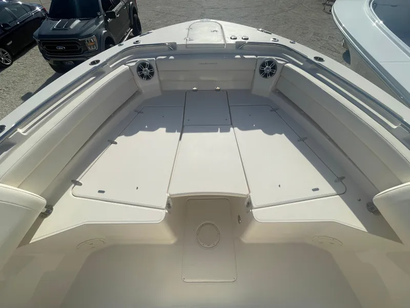 Slide: The Image of 2025 Grady-White Canyon 326 boat interior with spacious seating and modern design. - 3