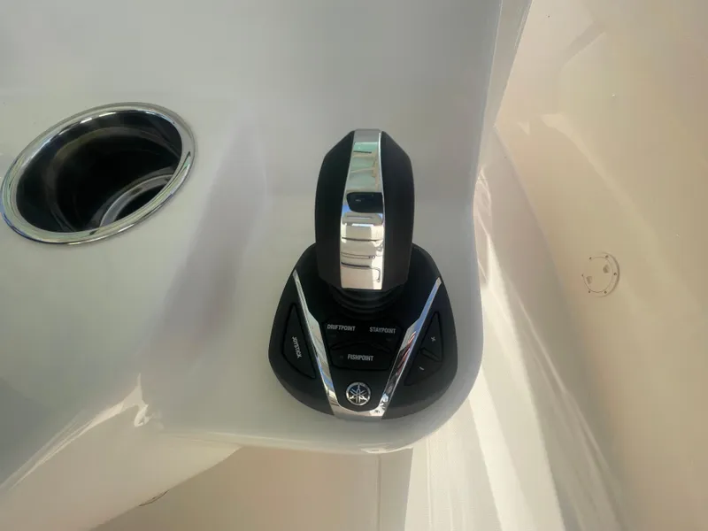 Slide: The Image of Grady-White Canyon 326 2025 boat throttle control, sleek design, modern functionality. - 7