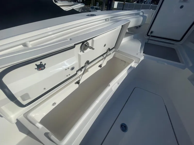 Slide: The Image of 2025 Regulator 28 boat storage compartment, open and spacious design. - 19