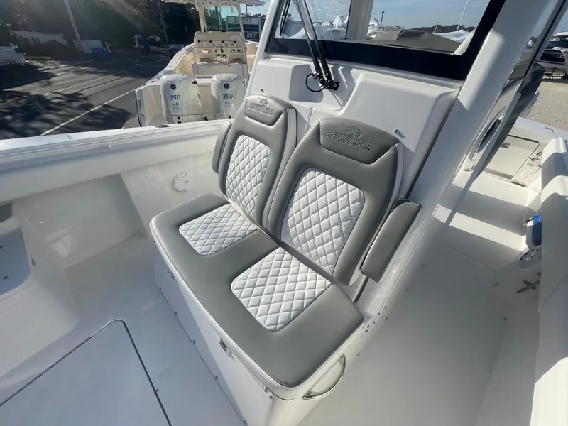 Slide: The Image of 2025 Regulator 28 boat with luxurious quilted seating. - 22