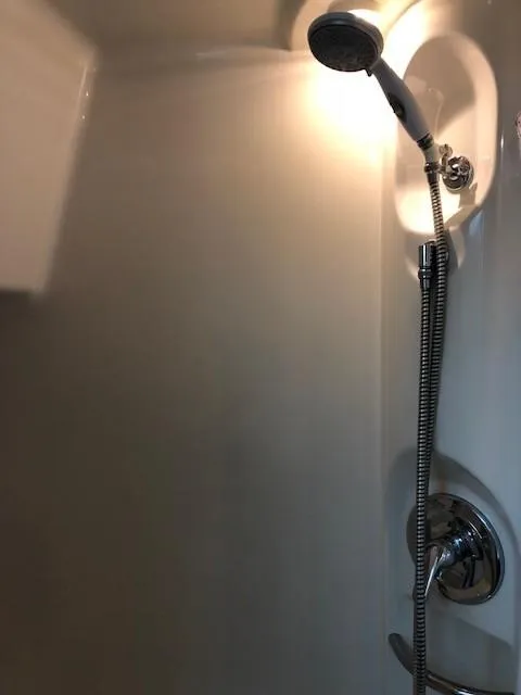 Slide: The Image of Shower area in 2000 Bayliner 4087 Aft Cabin Motoryacht, featuring modern fixtures. - 21