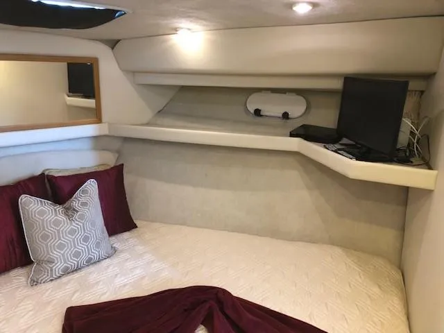 Slide: The Image of Cozy cabin interior of 2000 Bayliner 4087 Aft Cabin Motoryacht with bed and TV. - 39