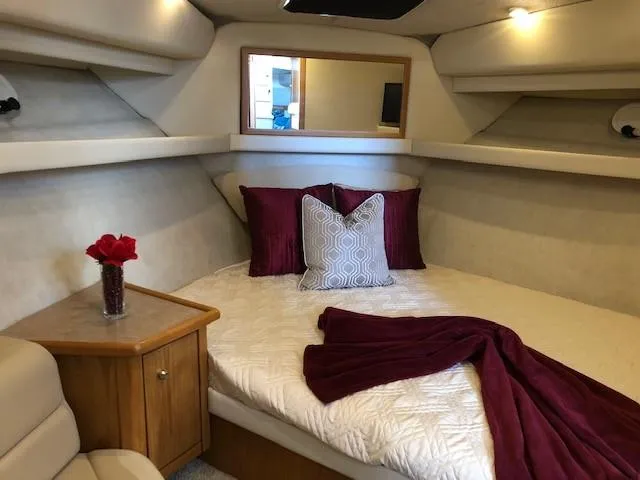 Slide: The Image of Luxurious cabin interior of 2000 Bayliner 4087 Aft Cabin Motoryacht with elegant bedding. - 41