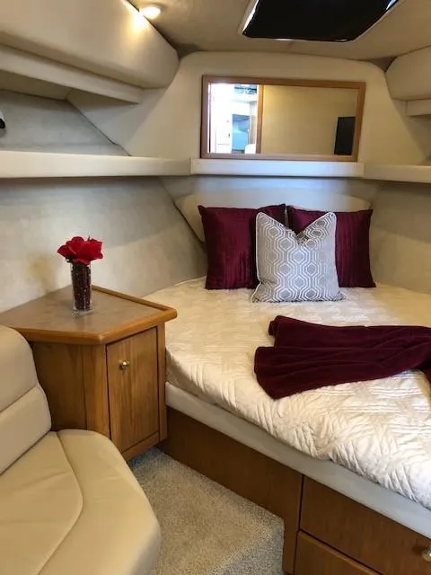 Slide: The Image of Luxurious cabin interior of 2000 Bayliner 4087 Aft Cabin Motoryacht with elegant bedding and decor. - 42