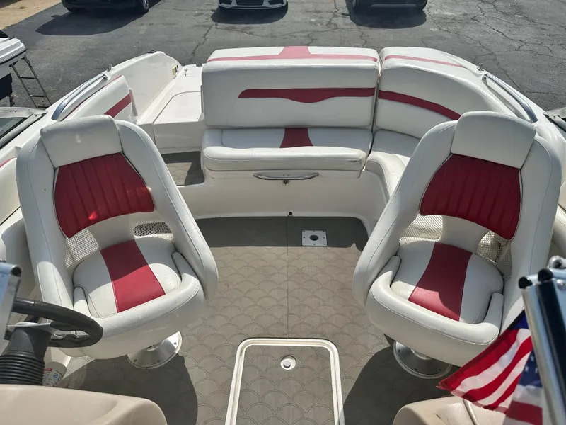 Slide: The Image of 2002 Chaparral 220WT SSi boat interior with red and white seating. - 9