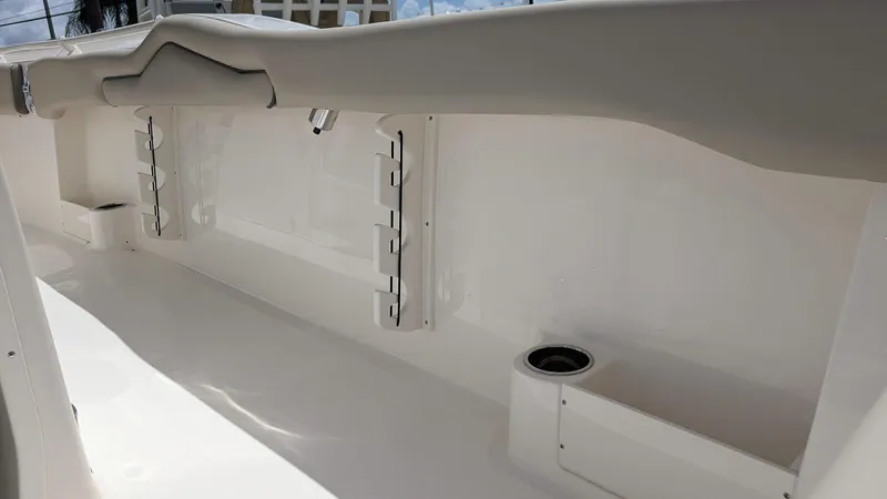 Slide: The Image of 2025 Key West 263 FS boat interior with rod holders and cup holder. - 14