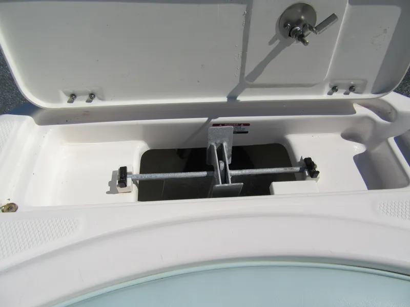 Slide: The Image of Anchor storage compartment on 2022 Robalo R222 Center Console boat. - 11