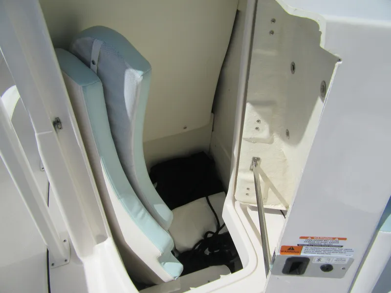 Slide: The Image of Storage compartment in 2022 Robalo R222 Center Console boat. - 7