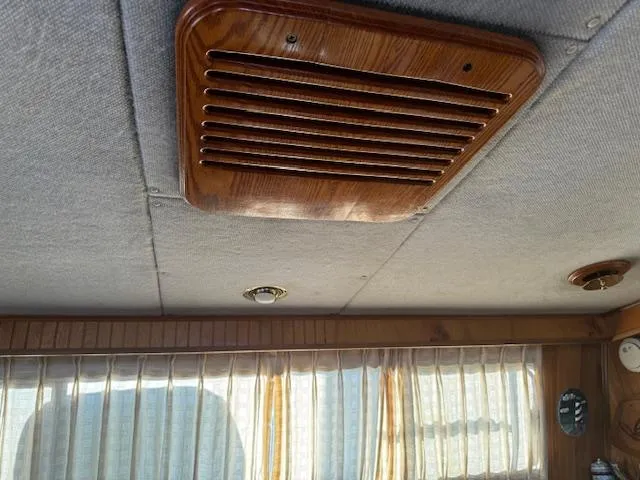 Slide: The Image of Wooden vent on ceiling of 1994 Gibson 44 Standard boat interior. - 18