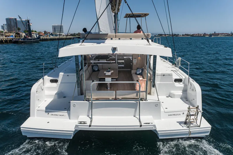 Slide: The Image of 2025 Bali CATSPACE catamaran sailing on open water, showcasing spacious deck and modern design. - 30