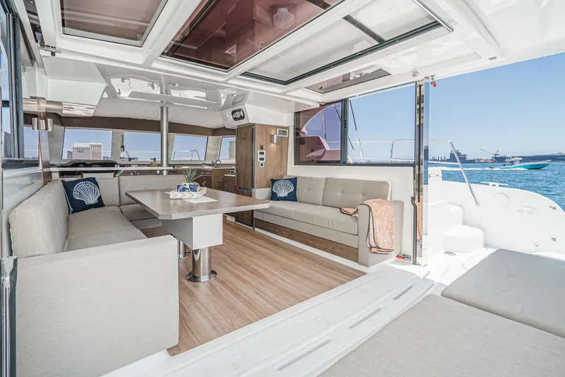 Slide: The Image of Luxurious interior of 2025 Bali CATSPACE catamaran with modern seating and ocean view. - 32