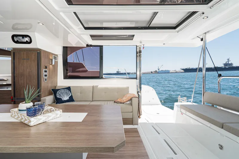 Slide: The Image of Luxurious interior of 2025 Bali CATSPACE catamaran with ocean view and modern furnishings. - 33