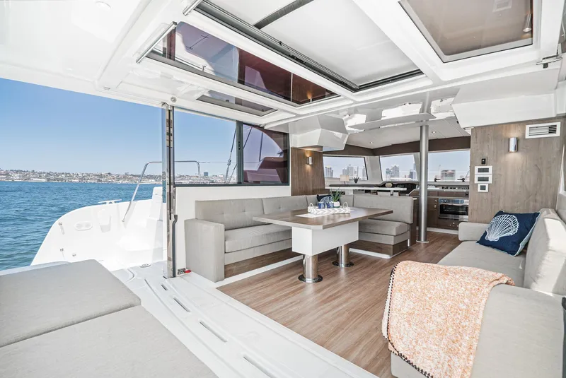 Slide: The Image of Luxurious 2025 Bali CATSPACE yacht interior with modern seating and ocean view. - 35