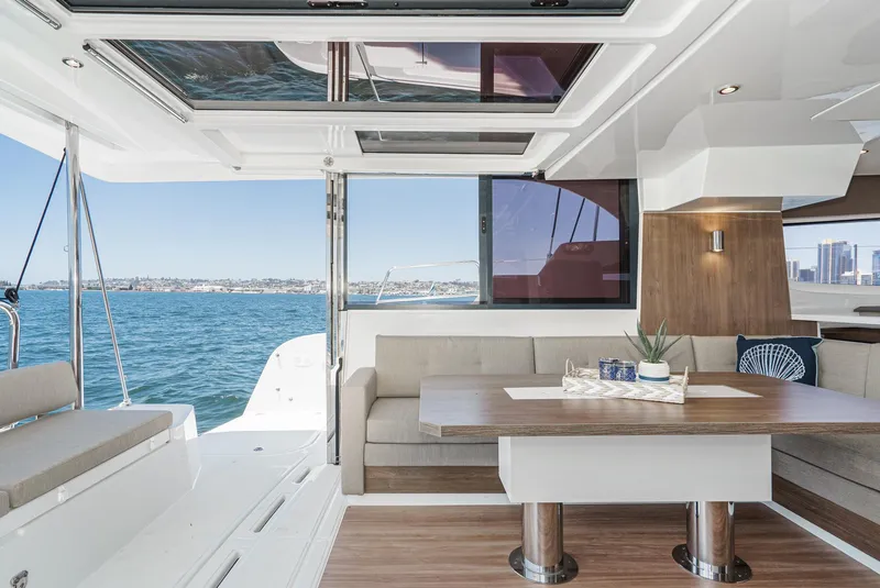 Slide: The Image of Luxurious 2025 Bali CATSPACE yacht interior with ocean view and modern seating area. - 36