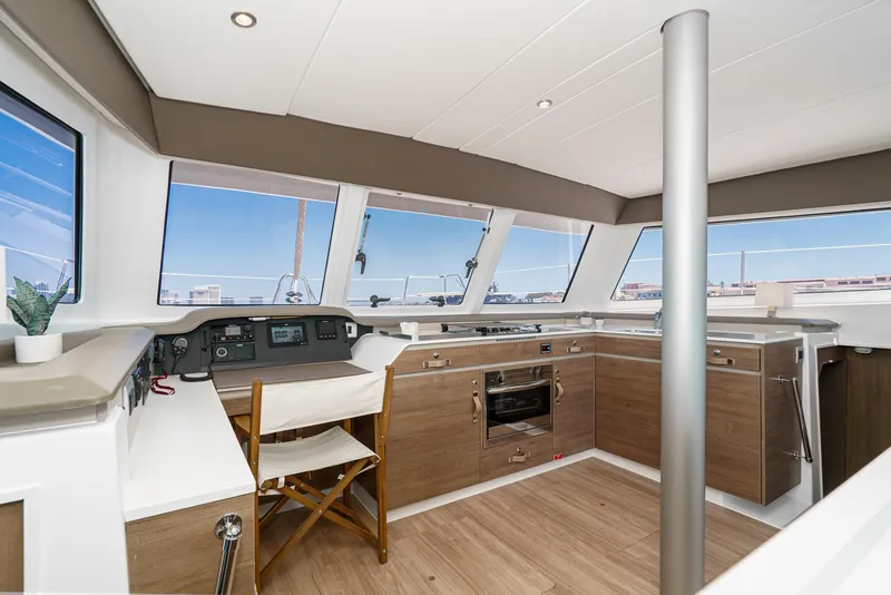 Slide: The Image of Modern 2025 Bali CATSPACE yacht interior with sleek kitchen and panoramic windows. - 41