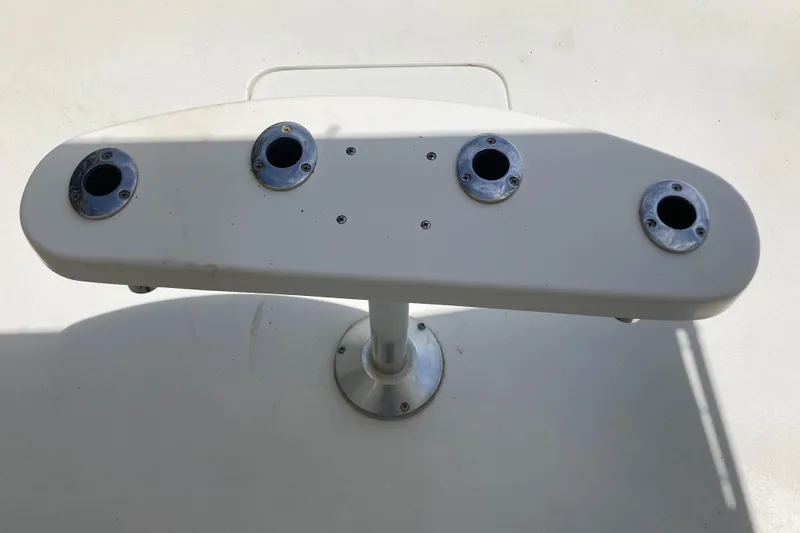 Slide: The Image of Fishing rod holder on 1976 Hatteras 46 boat deck. - 14