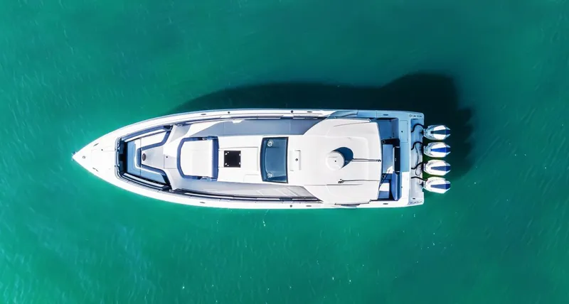 Slide: The Image of Aerial view of 2023 Cigarette 42 Auroris boat on turquoise water. - 10