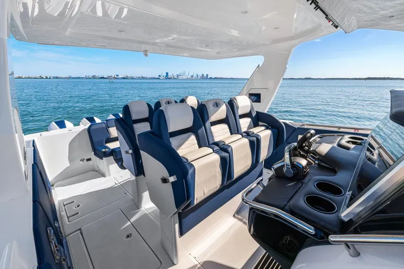 Slide: The Image of Luxurious 2023 Cigarette 42 Auroris boat interior with plush seating and ocean view. - 19