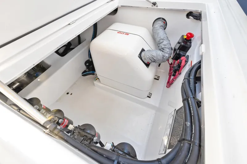 Slide: The Image of Engine compartment of 2023 Cigarette 42 Auroris boat, showcasing mechanical components. - 34