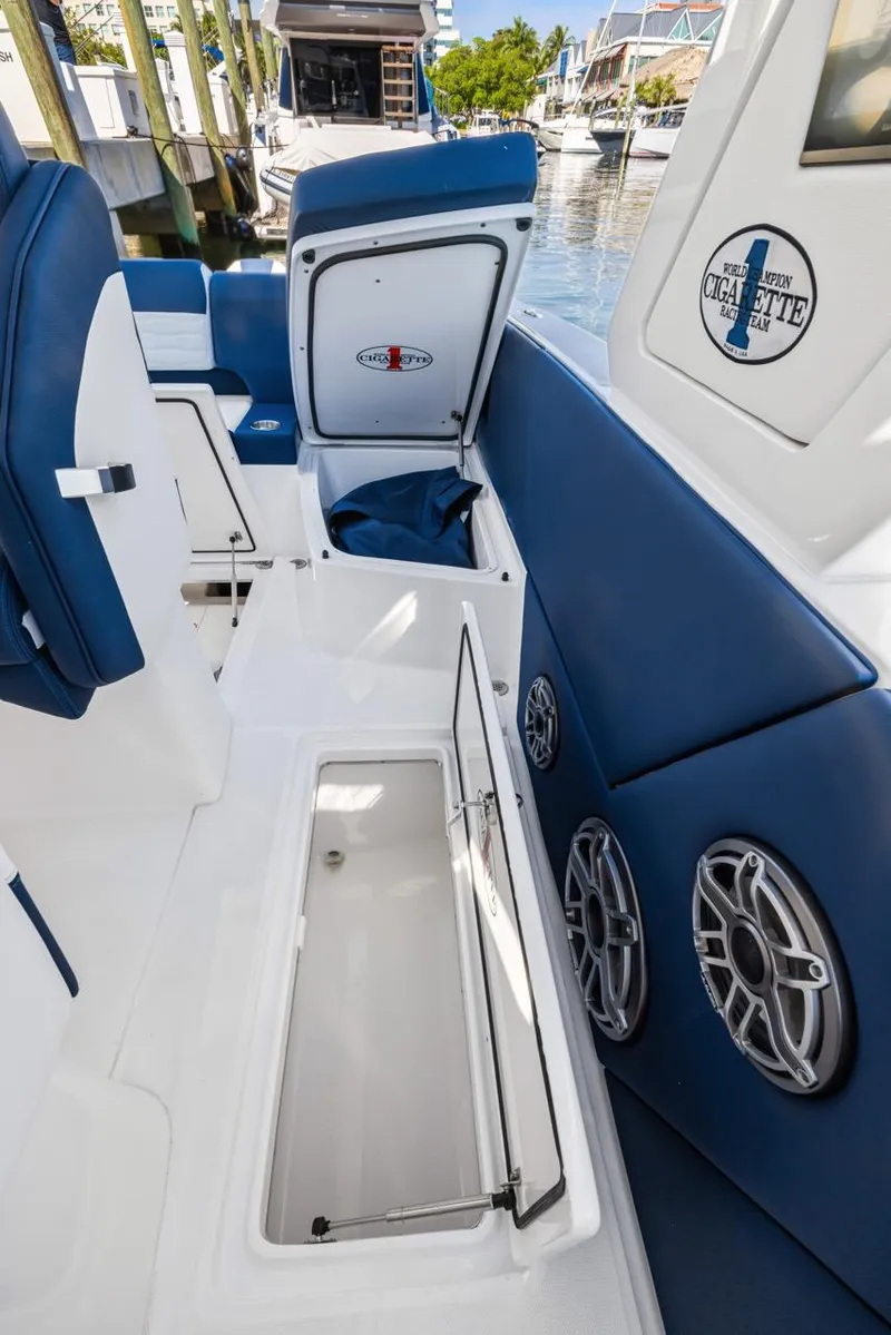 Slide: The Image of 2023 Cigarette 42 Auroris boat interior with blue seating and storage compartments. - 36