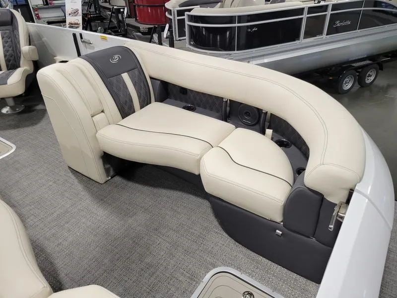 Slide: The Image of 2024 Barletta LEGGERA R26UCA pontoon boat interior with luxurious seating. - 10