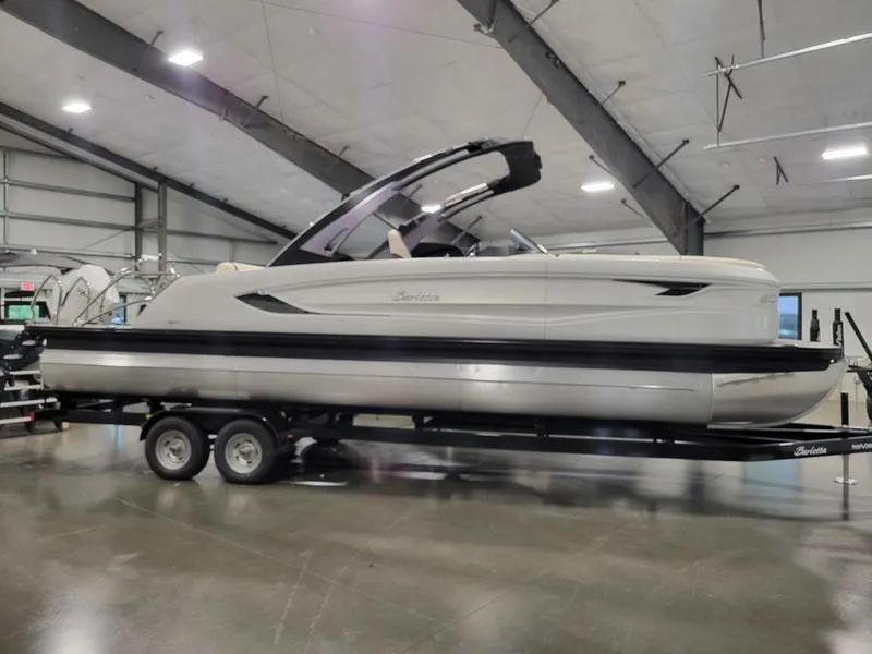 Slide: The Image of 2024 Barletta LEGGERA R26UCA pontoon boat on trailer in indoor showroom. - 21