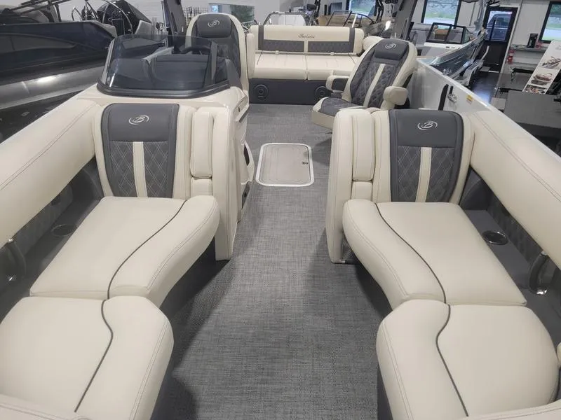 Slide: The Image of 2024 Barletta LEGGERA R26UCA boat interior with luxurious seating and modern design. - 9