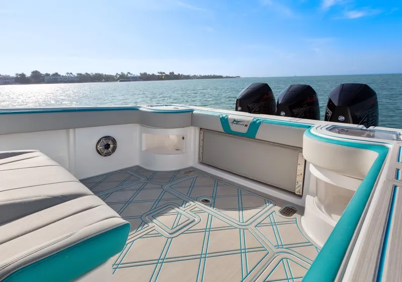 Slide: The Image of 2025 Streamline 35 CC boat interior with ocean view and triple engines. - 15