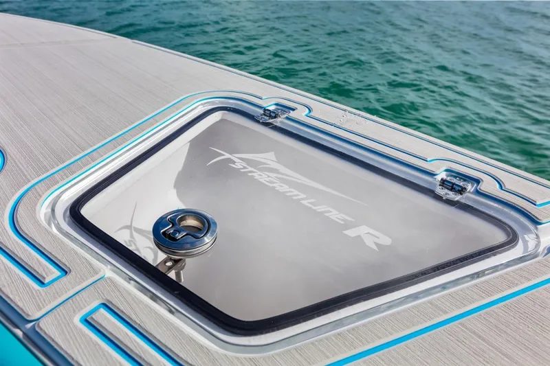 Slide: The Image of Streamline 35 CC 2025 boat hatch detail with ocean background. - 19
