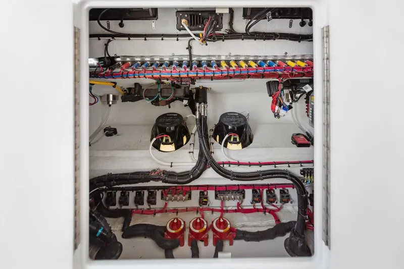 Slide: The Image of 2025 Streamline 35 CC electrical panel with organized wiring and components. - 32